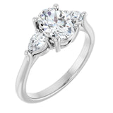 Trilogy Ring with oval centre stone and two pear shape side stones-Setting-The Diamond Setter