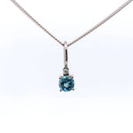 Dainty aquamarine and diamond pendant-The Diamond Setter