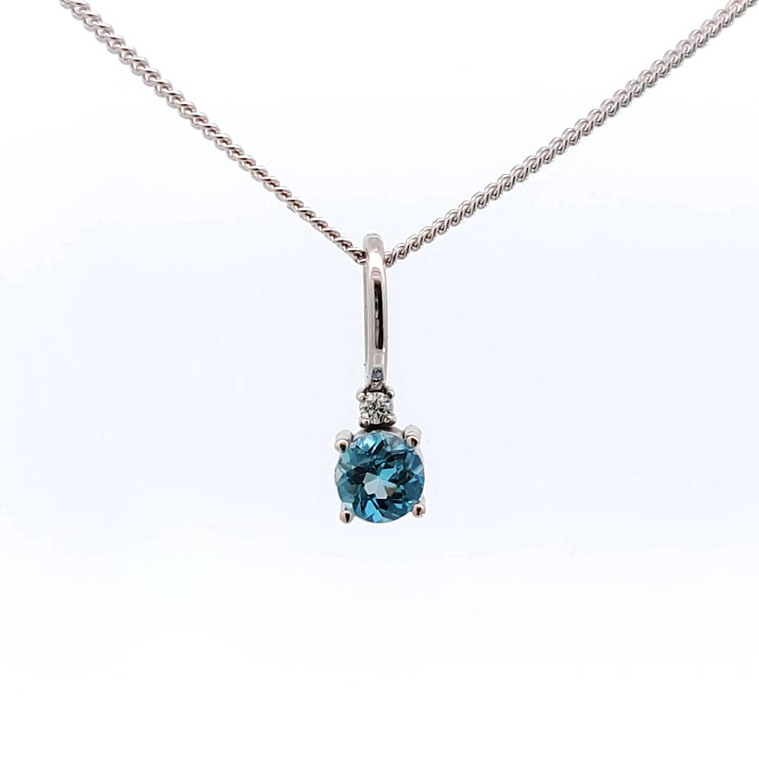 Dainty aquamarine and diamond pendant-The Diamond Setter