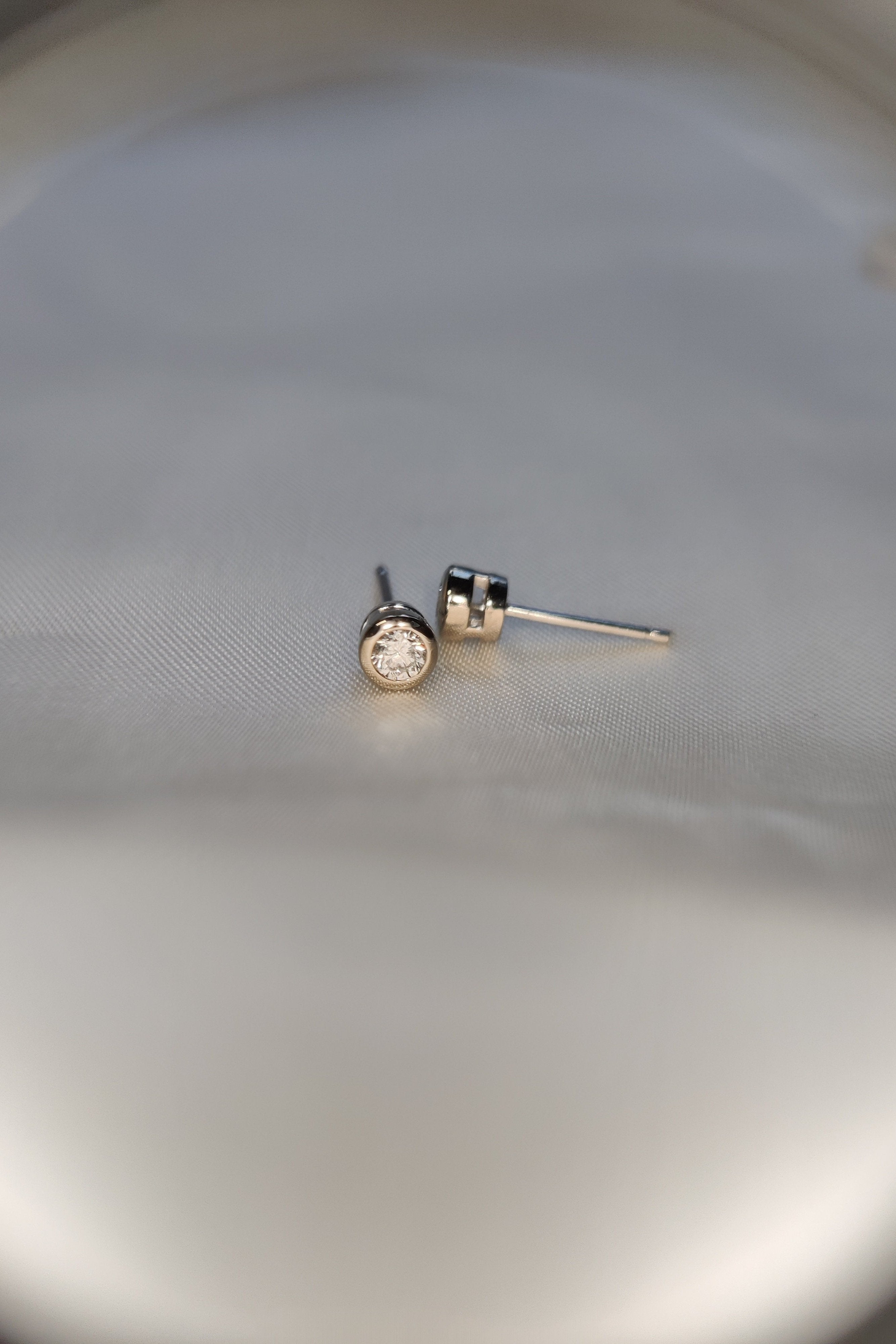 Round Tapered Bezel-Set Stud Earring in 9ct white gold-The Diamond Setter