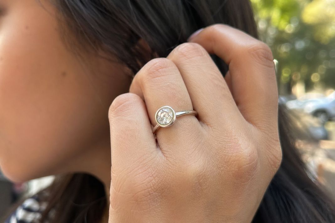 What is a bezel set engagement ring and is it better for everyday wear?