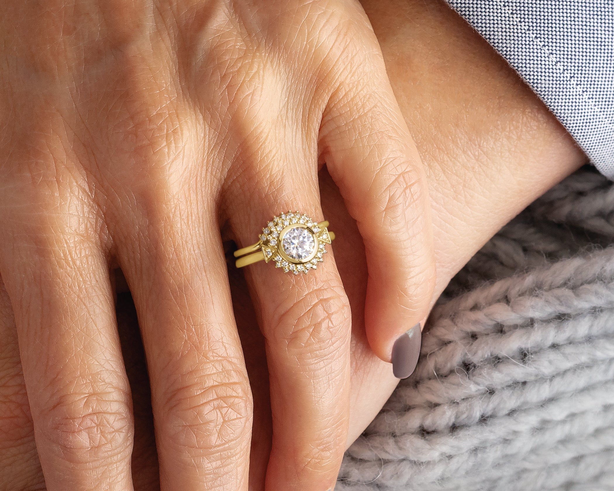 a diamond set on a unique spiral shaped gold ring