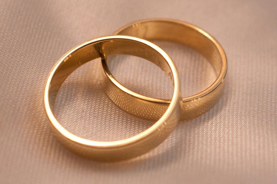 two gold wedding bands