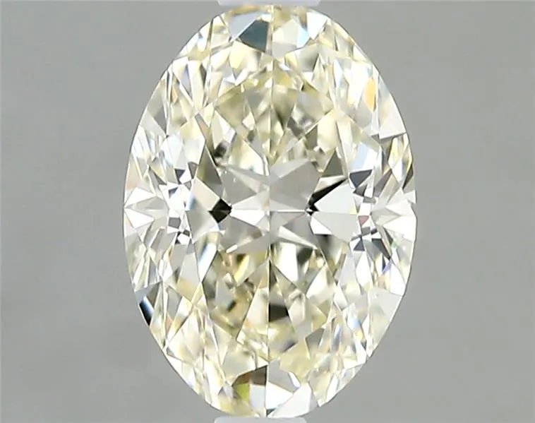 0.61ct Oval Natural Diamond (Colour J, Clarity VS1, Cut VG, IGI Certified)