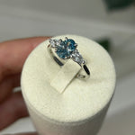 Platinum 1ct Oval Cut Blue Diamond Trilogy Engagement Ring-The Diamond Setter