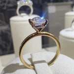 18ct Yellow Gold Oval Solitaire Engagement Ring with Diamond-Set Claws-The Diamond Setter