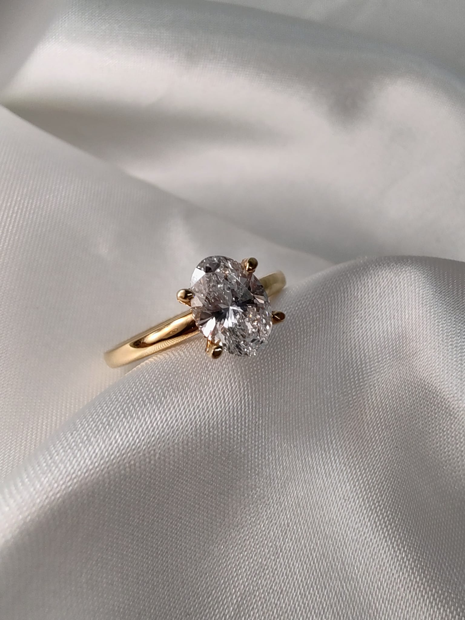 18ct Yellow Gold Oval Solitaire Engagement Ring with Diamond-Set Claws-The Diamond Setter