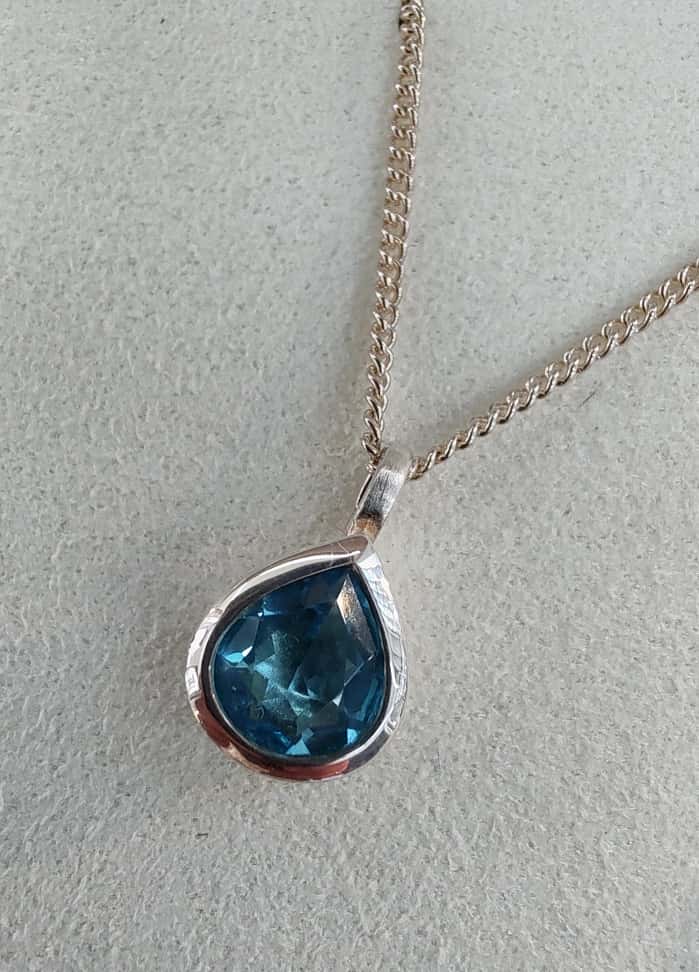 Pear Cut Topaz Pendant-The Diamond Setter