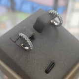 9ct White Gold Blue Topaz Huggie Earrings-The Diamond Setter
