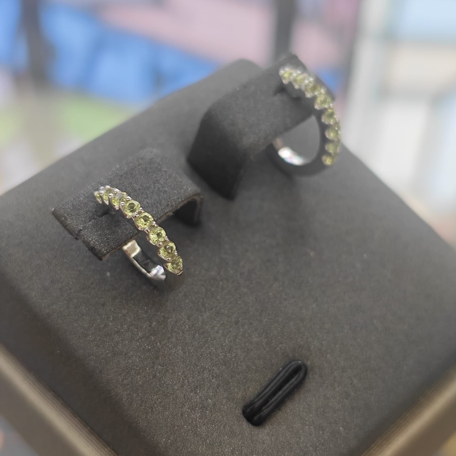 9CT White Gold Peridot Huggie Earrings-The Diamond Setter