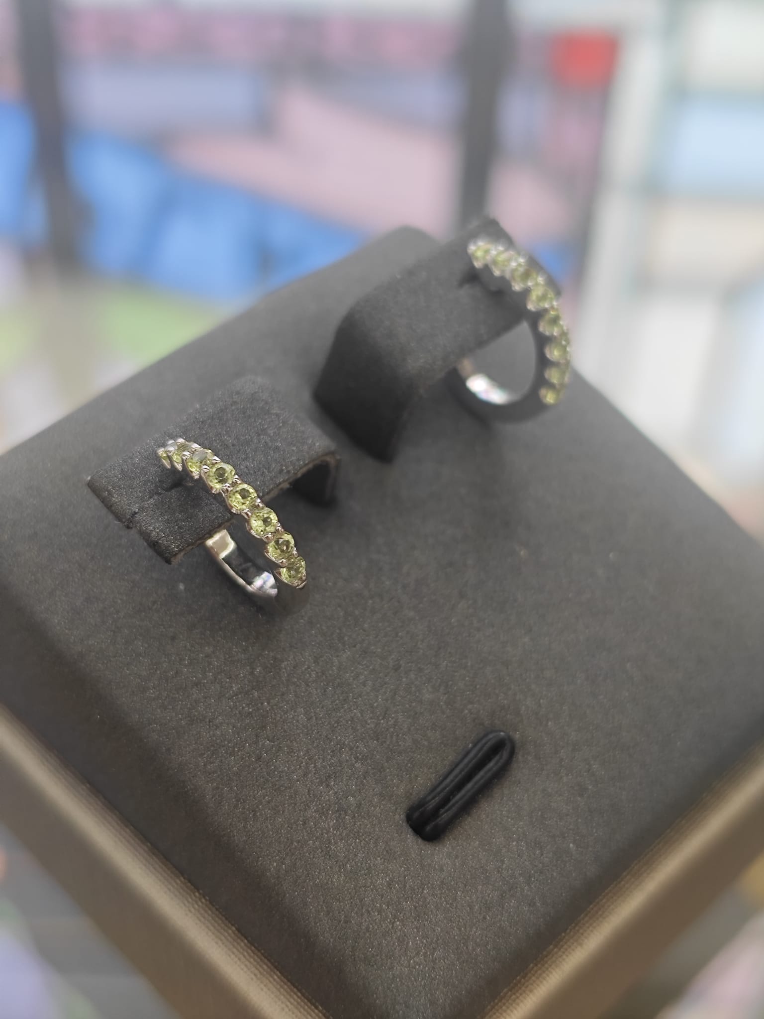 9CT White Gold Peridot Huggie Earrings-The Diamond Setter