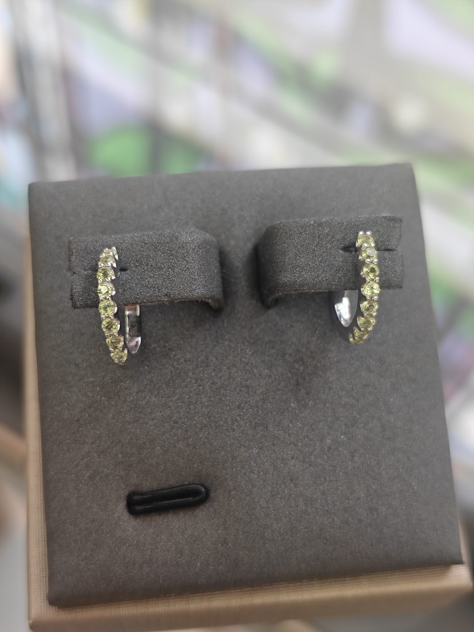 9CT White Gold Peridot Huggie Earrings-The Diamond Setter