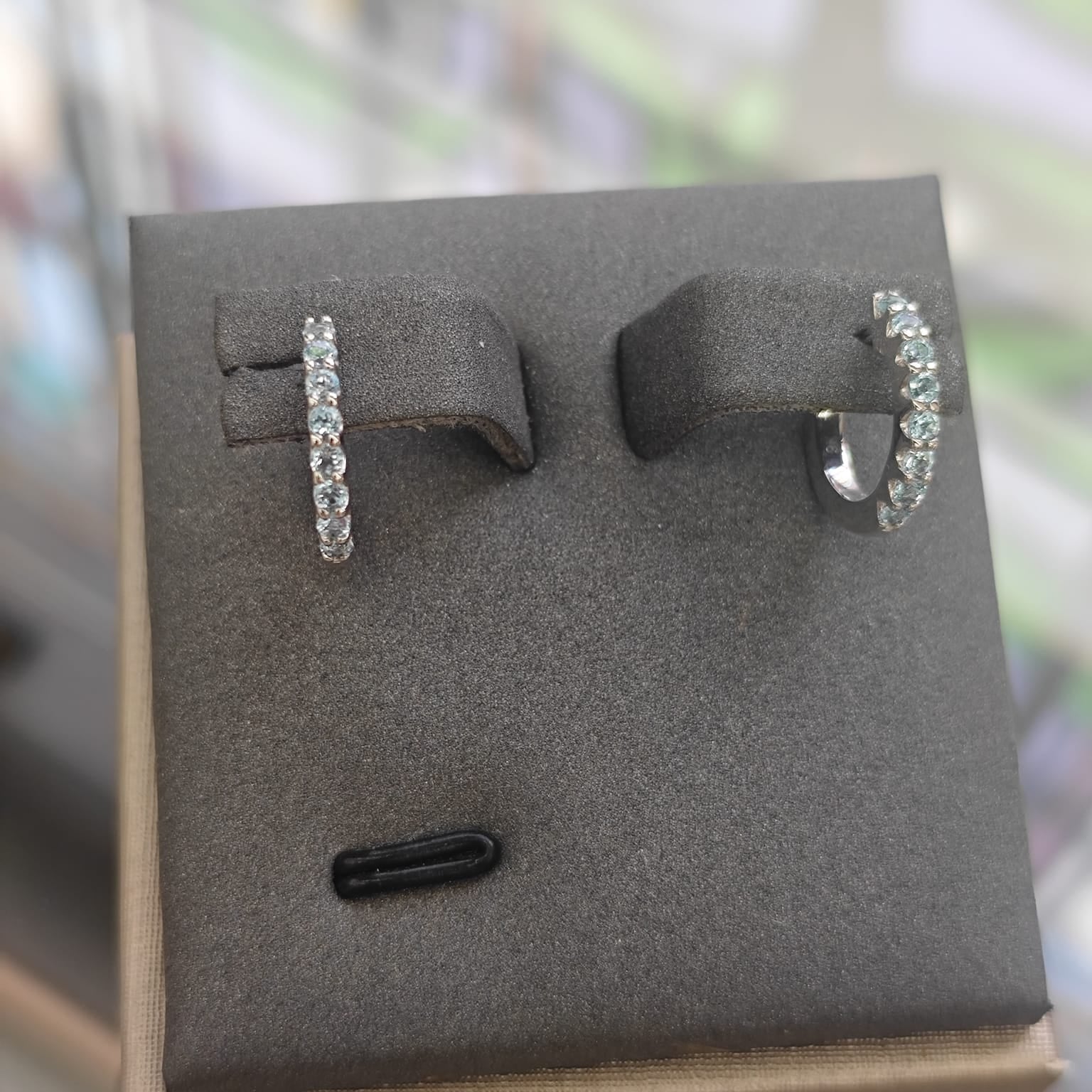 9ct White Gold Blue Topaz Huggie Earrings-The Diamond Setter