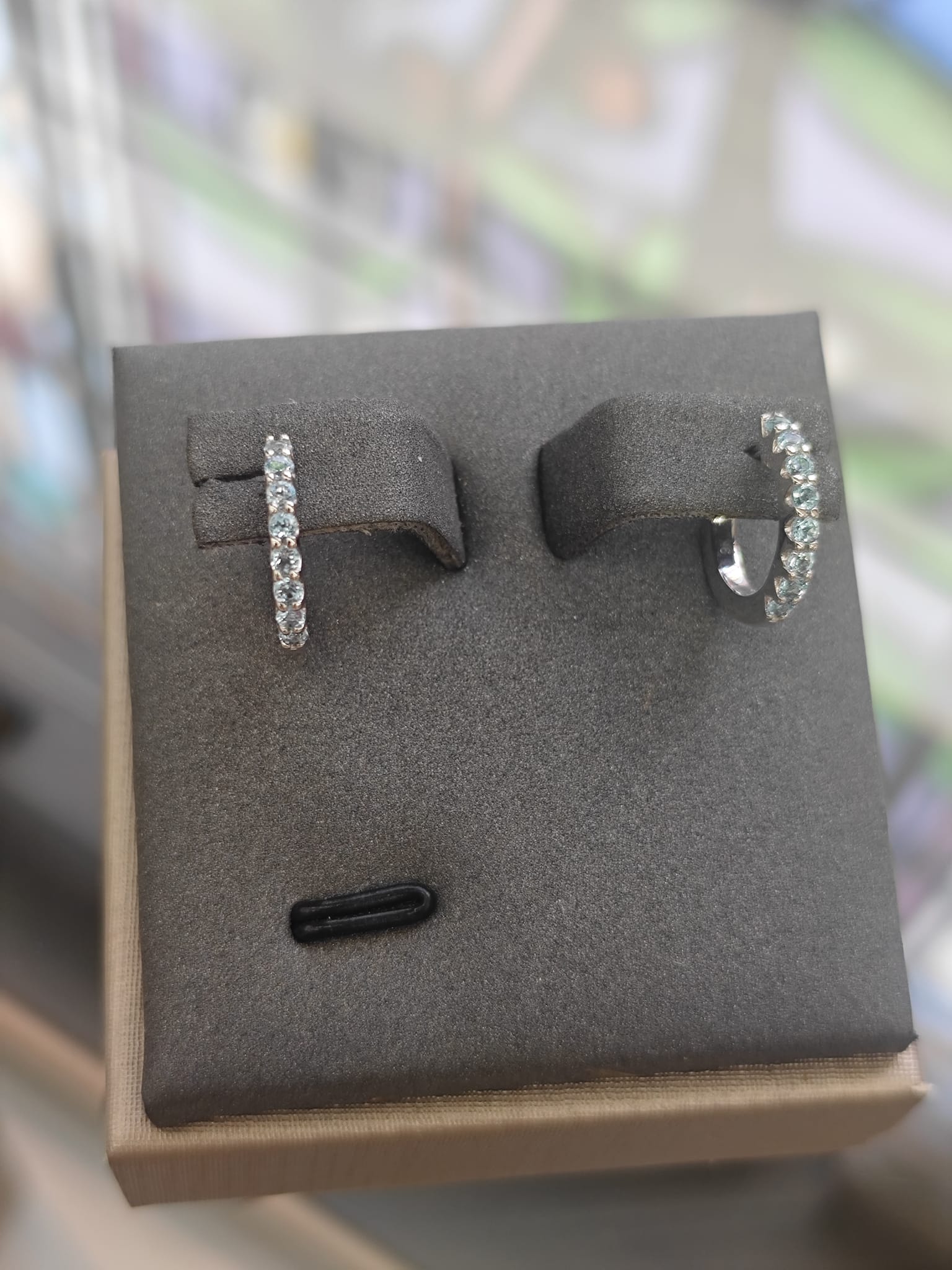 9ct White Gold Blue Topaz Huggie Earrings-The Diamond Setter