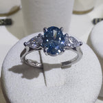 Platinum 1ct Oval Cut Blue Diamond Trilogy Engagement Ring-The Diamond Setter