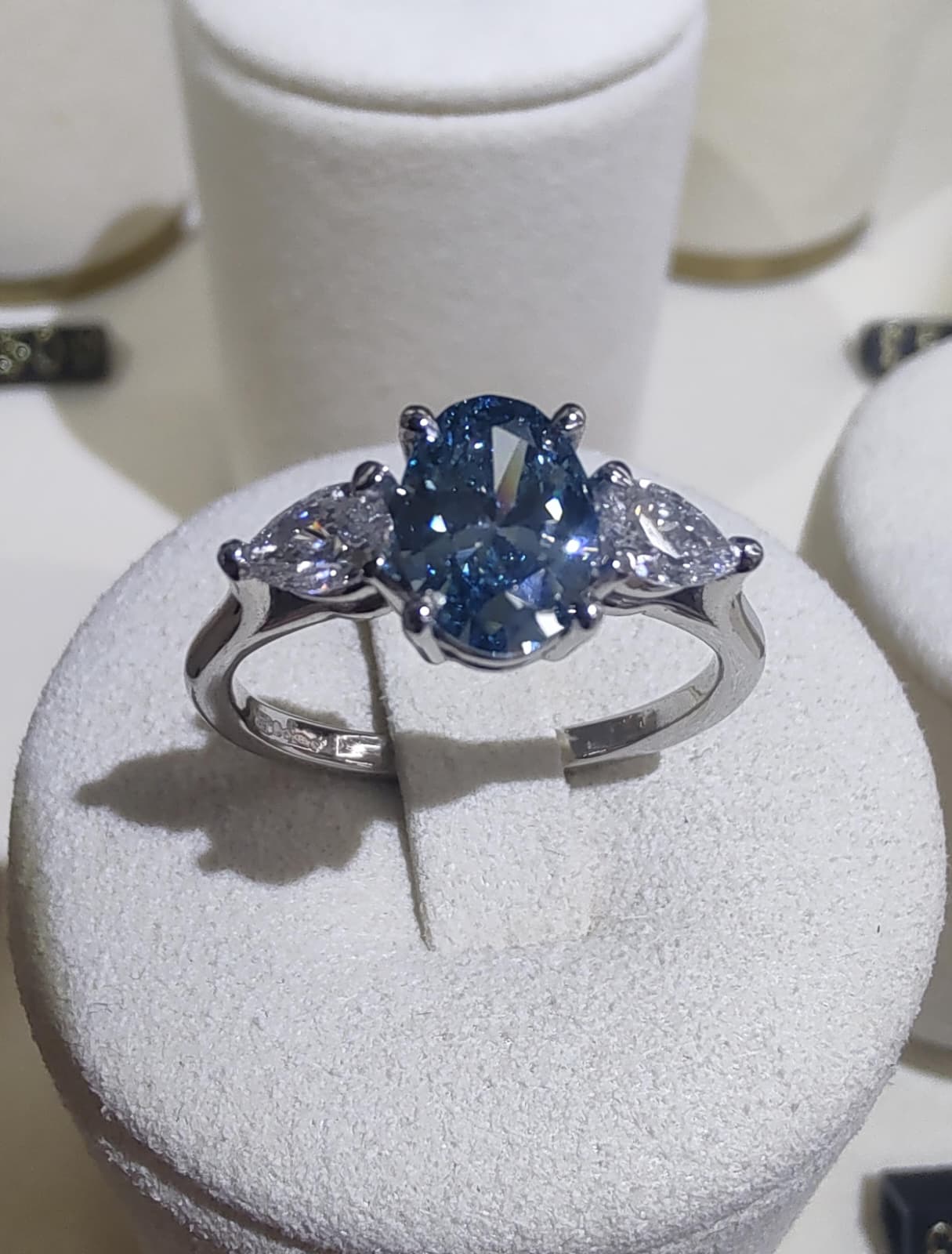 Platinum 1ct Oval Cut Blue Diamond Trilogy Engagement Ring-The Diamond Setter