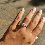 Round French-Set Bypass Engagement Ring with blue diamond accents-The Diamond Setter