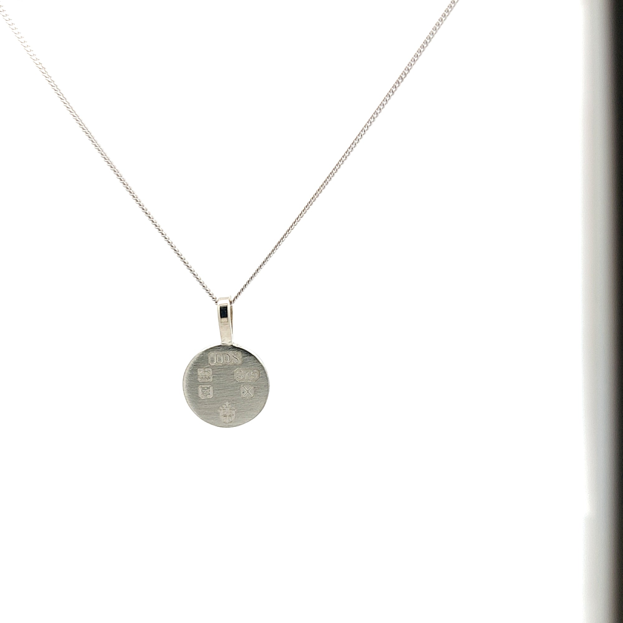 Disc pendant with platinum jubilee hallmark-The Diamond Setter