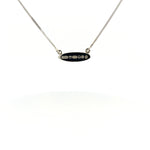 Petit oval pendant with platinum jubilee hallmark-The Diamond Setter
