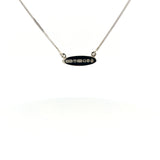 Petit oval pendant with platinum jubilee hallmark-The Diamond Setter